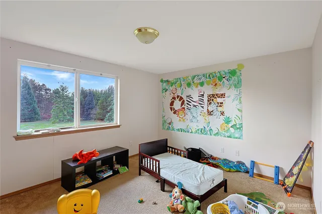 a bathroom with a sink vanity granite and a mirror