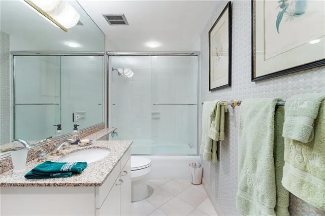 a view of a hallway with seating space