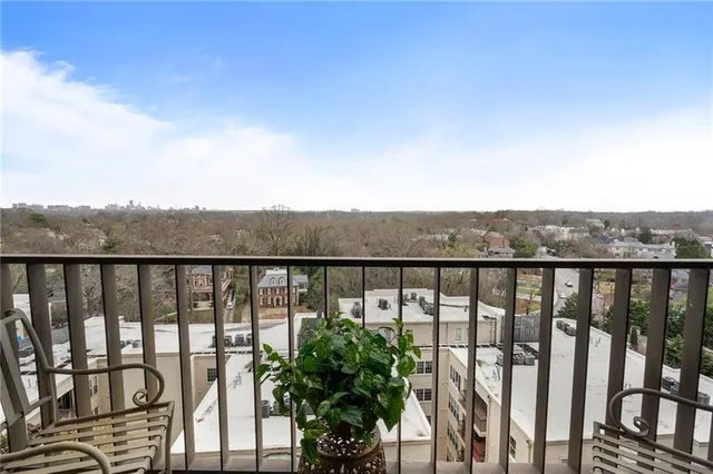 a dining room with furniture and chandelier