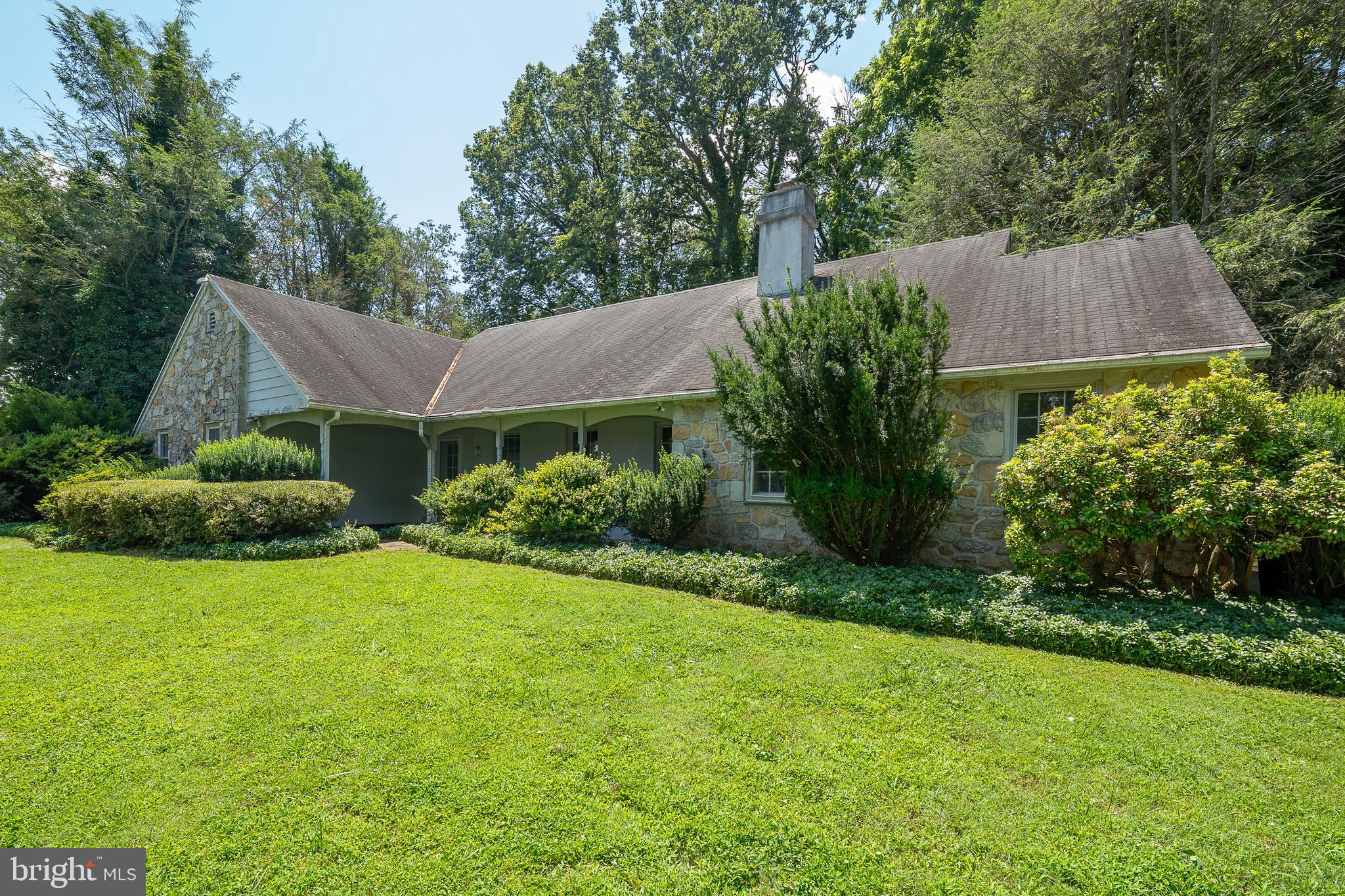 2227 North Stone Ridge Lane Villanova, PA 19085 - Photo 1 of 49 a view of a house with a yard and plants