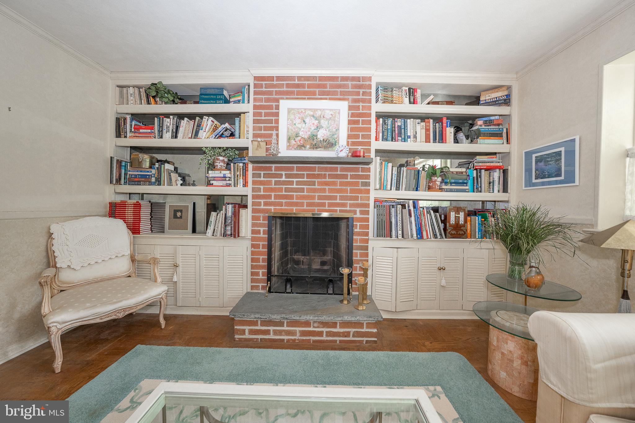 2227 North Stone Ridge Lane Villanova, PA 19085 - Photo 13 of 49 a living room with furniture and a book shelf