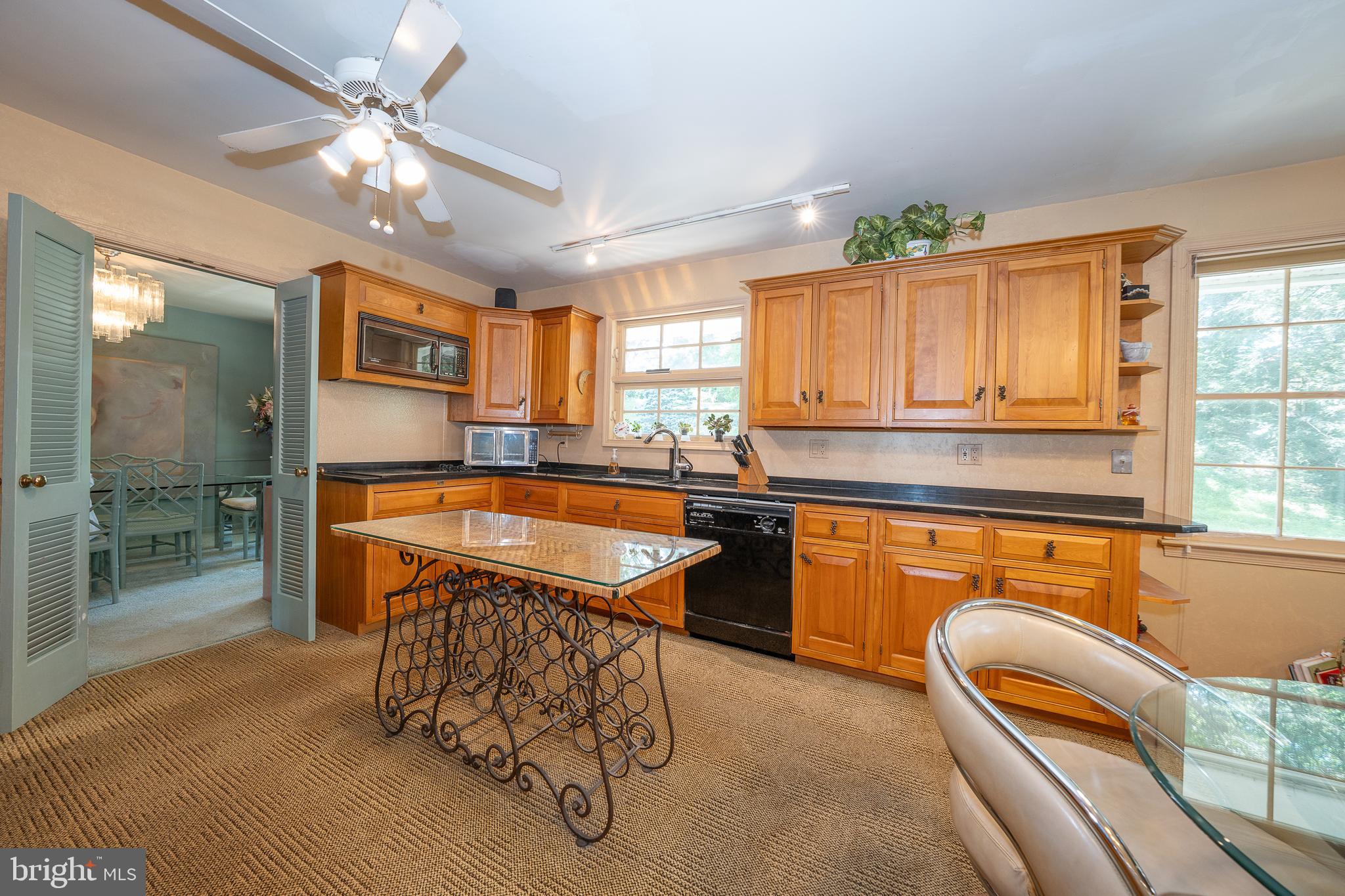 2227 North Stone Ridge Lane Villanova, PA 19085 - Photo 15 of 49 a kitchen with stainless steel appliances granite countertop a sink a stove and a refrigerator