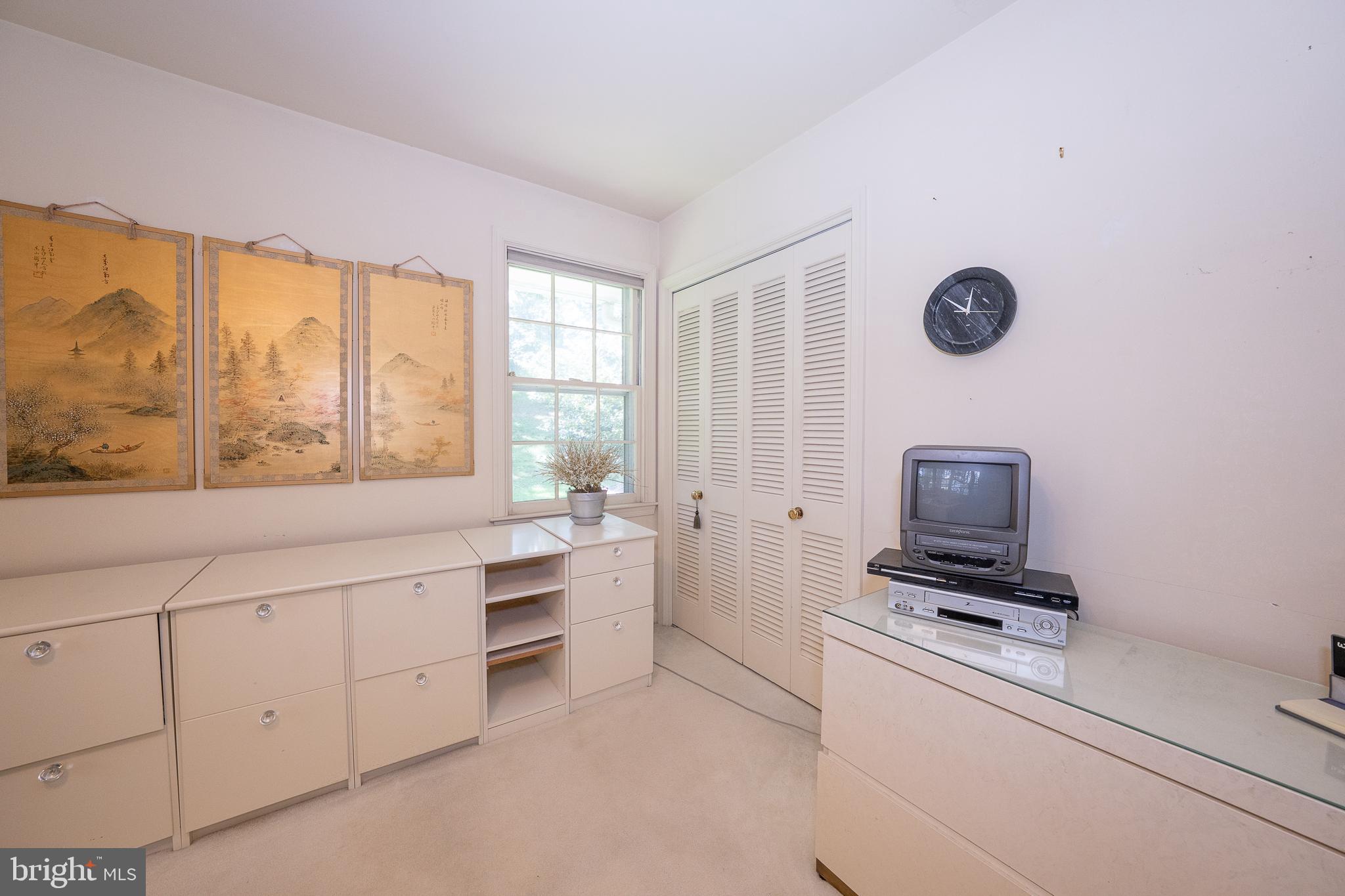 2227 North Stone Ridge Lane Villanova, PA 19085 - Photo 24 of 49 a room with a bed and a window