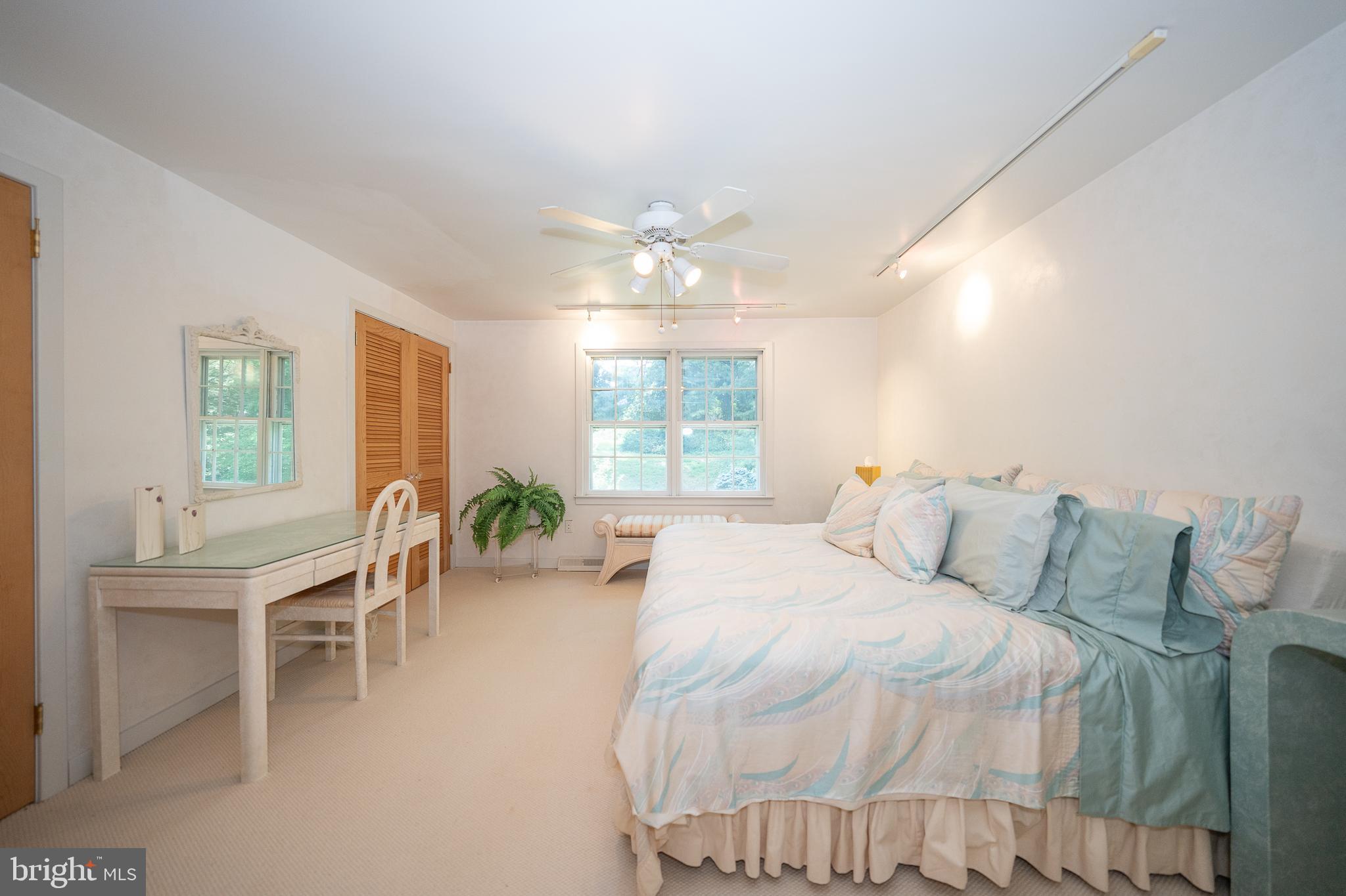 2227 North Stone Ridge Lane Villanova, PA 19085 - Photo 27 of 49 a bedroom with a bed and a large window