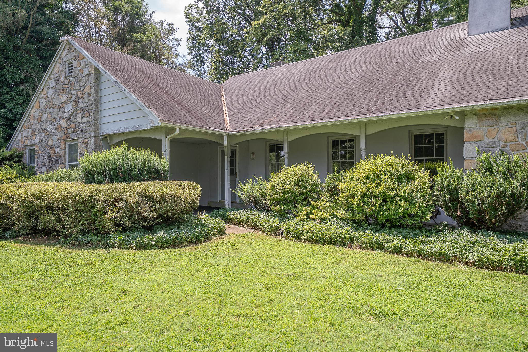 2227 North Stone Ridge Lane Villanova, PA 19085 - Photo 3 of 49 a view of a house with a yard and potted plants
