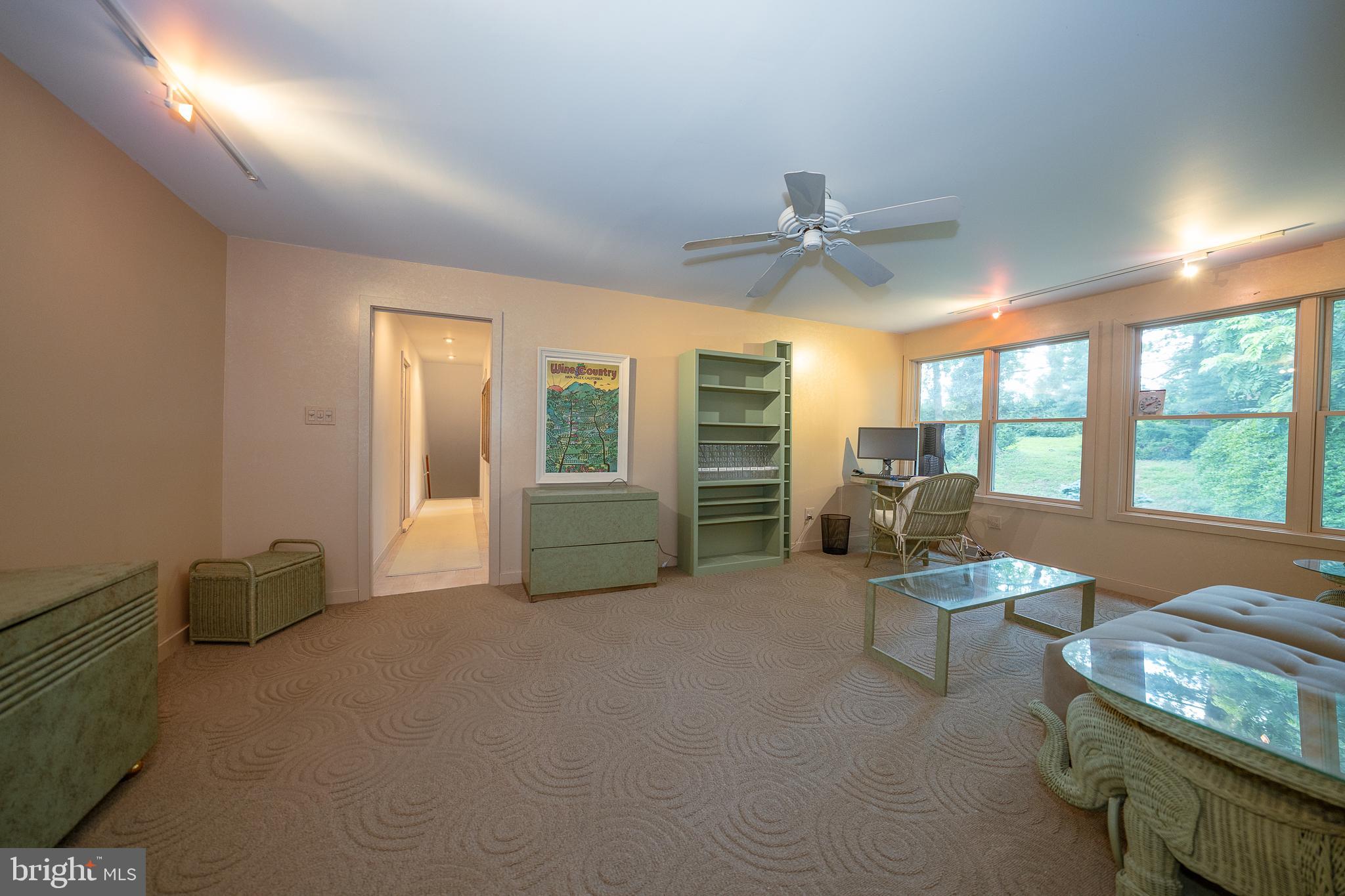 2227 North Stone Ridge Lane Villanova, PA 19085 - Photo 34 of 49 a living room with furniture and large windows