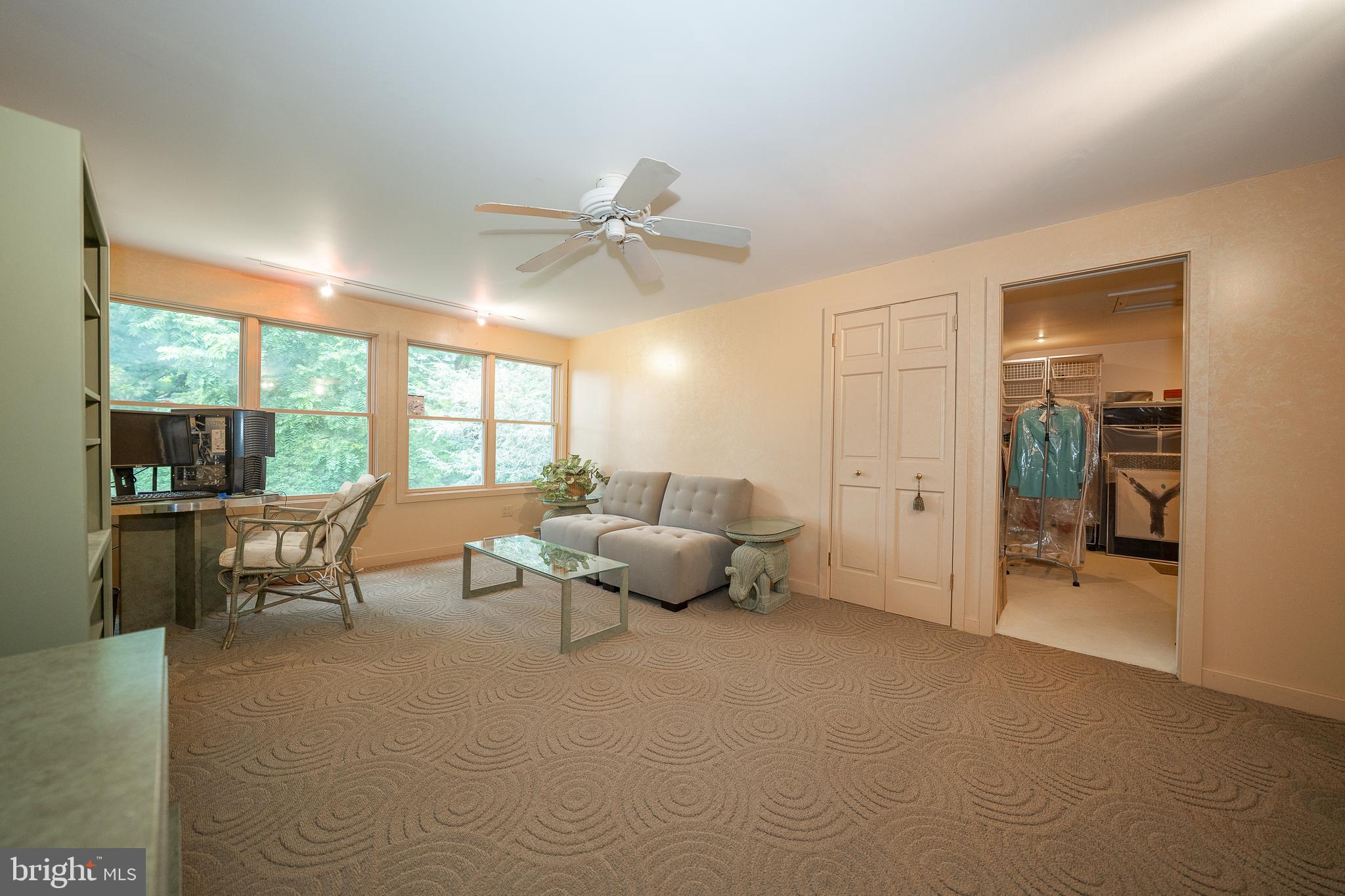 2227 North Stone Ridge Lane Villanova, PA 19085 - Photo 35 of 49 a living room with furniture and a floor to ceiling window