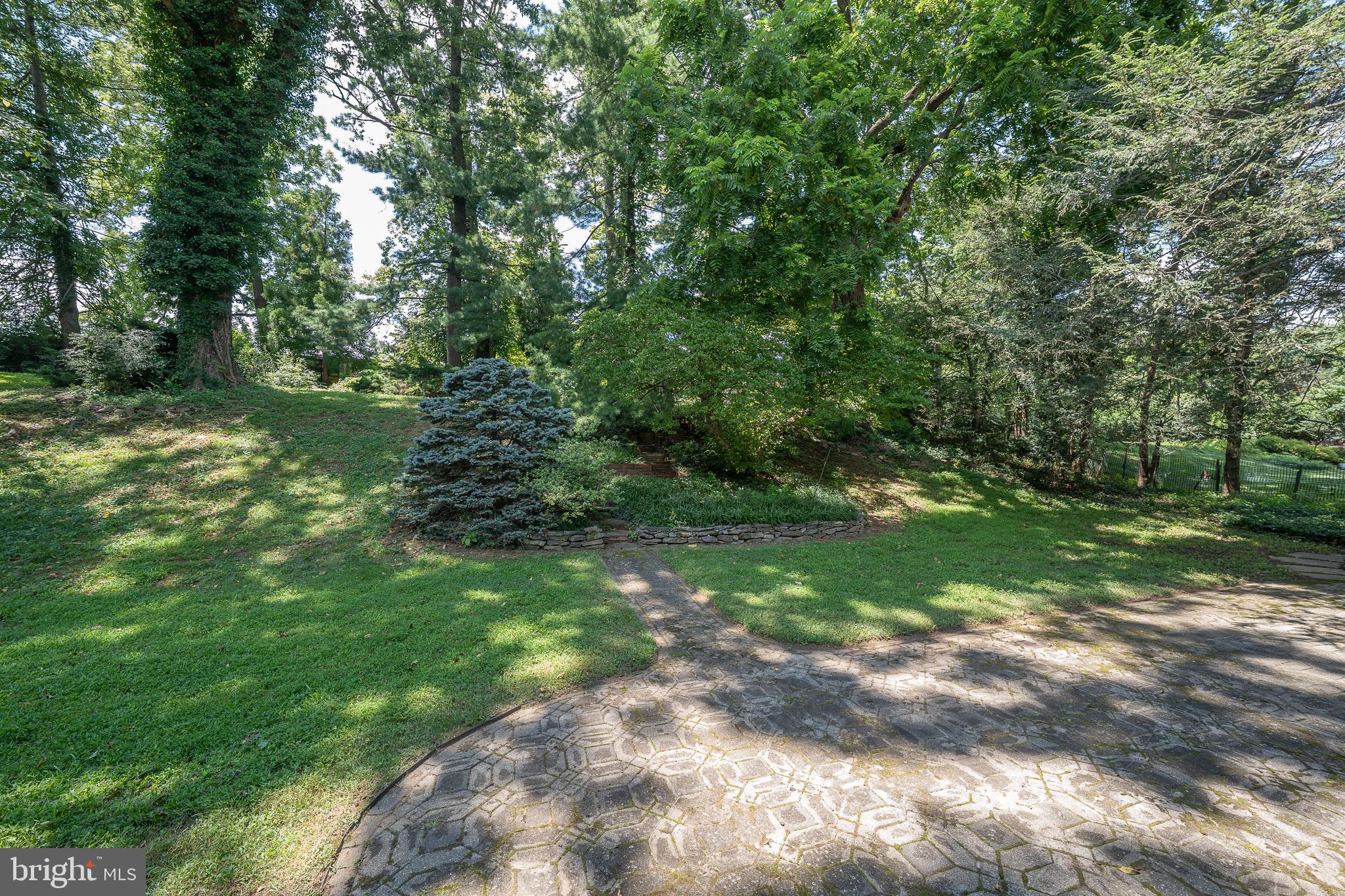 2227 North Stone Ridge Lane Villanova, PA 19085 - Photo 43 of 49 a view of a yard with a tree