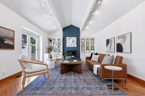 a bed room with a bed and a table