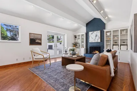 a bed room with a bed and a table