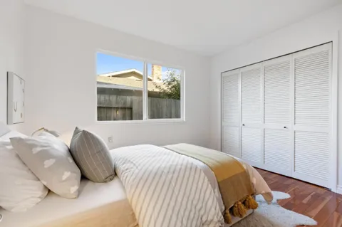 a view of an outside dining space with furniture