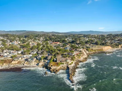 a view of a city with ocean view