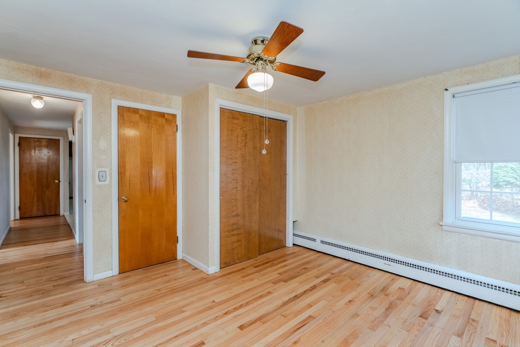 14 Hadley Street Springfield, MA 01118 - Photo 28 of 28 wooden floor in an empty room with a window