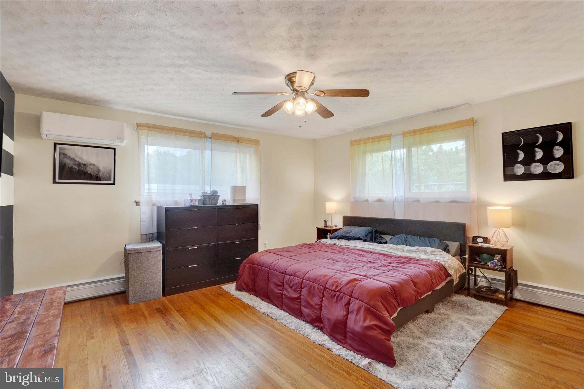 800 Delta Road Red Lion, PA 17356 - Photo 12 of 24 a bedroom with a bed and a dresser