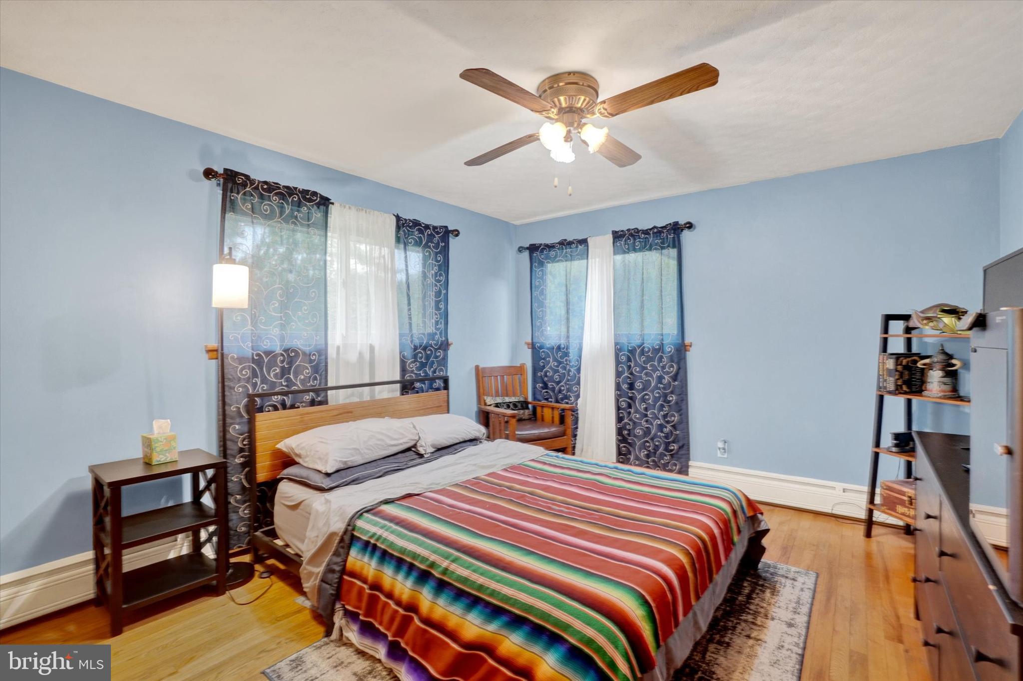 800 Delta Road Red Lion, PA 17356 - Photo 14 of 24 a bedroom with bed and a chandelier