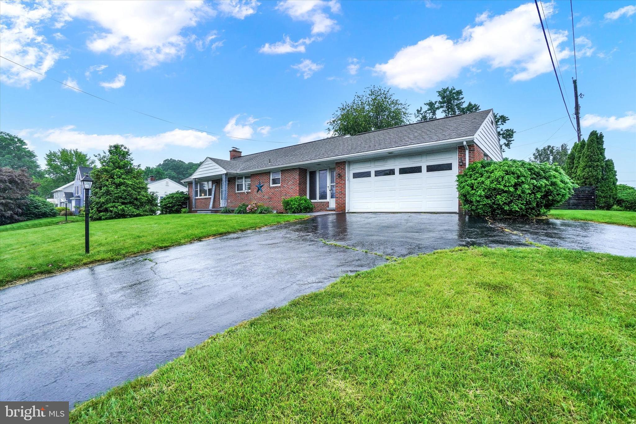 800 Delta Road Red Lion, PA 17356 - Photo 2 of 24 a front view of house with yard and green space