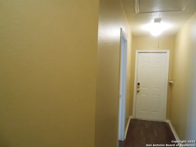 a view of a window in an empty room