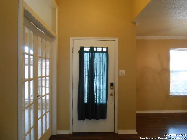 a kitchen with a sink and a window