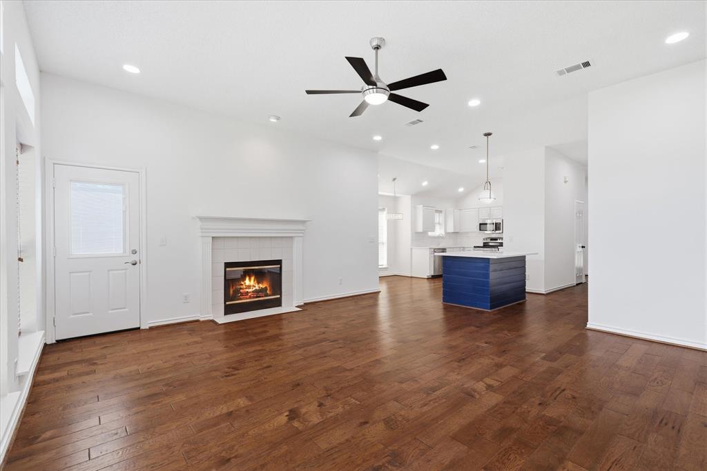 11313 Canoe Road Frisco, TX 75035 - Photo 21 of 40 Family Room view into the Kitchen