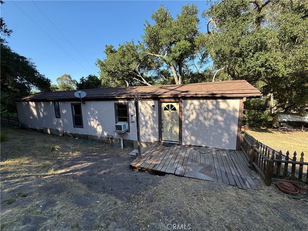 625 West Ormonde Road San Luis Obispo, CA 93401 - Photo 19 of 40 a view of a house with a yard and wooden fence