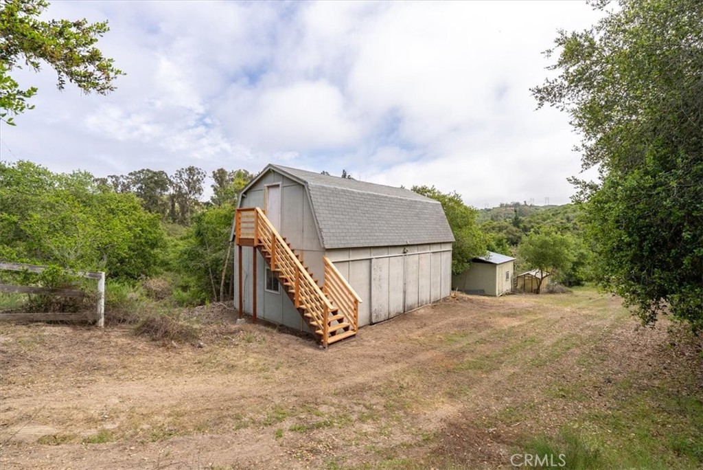625 West Ormonde Road San Luis Obispo, CA 93401 - Photo 7 of 40 a view of a house with a yard and wooden fence
