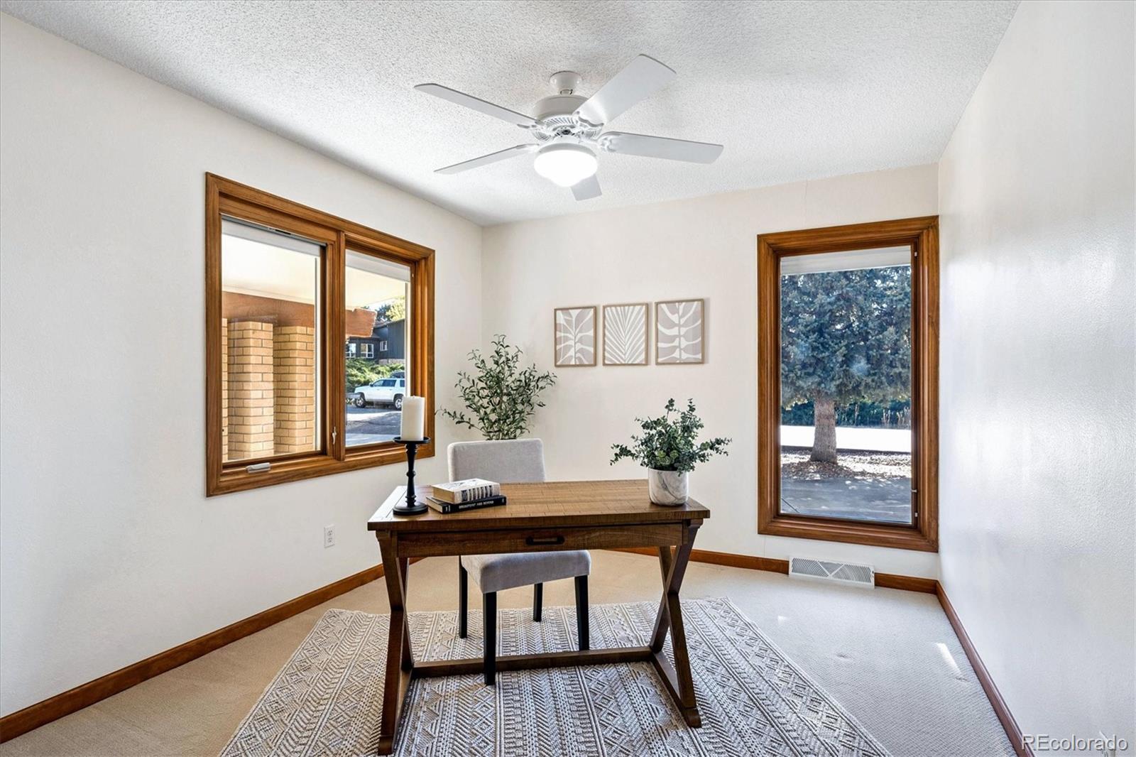 14935 West 58th Place Golden, CO 80403 - Photo 12 of 31 a workspace with furniture and window