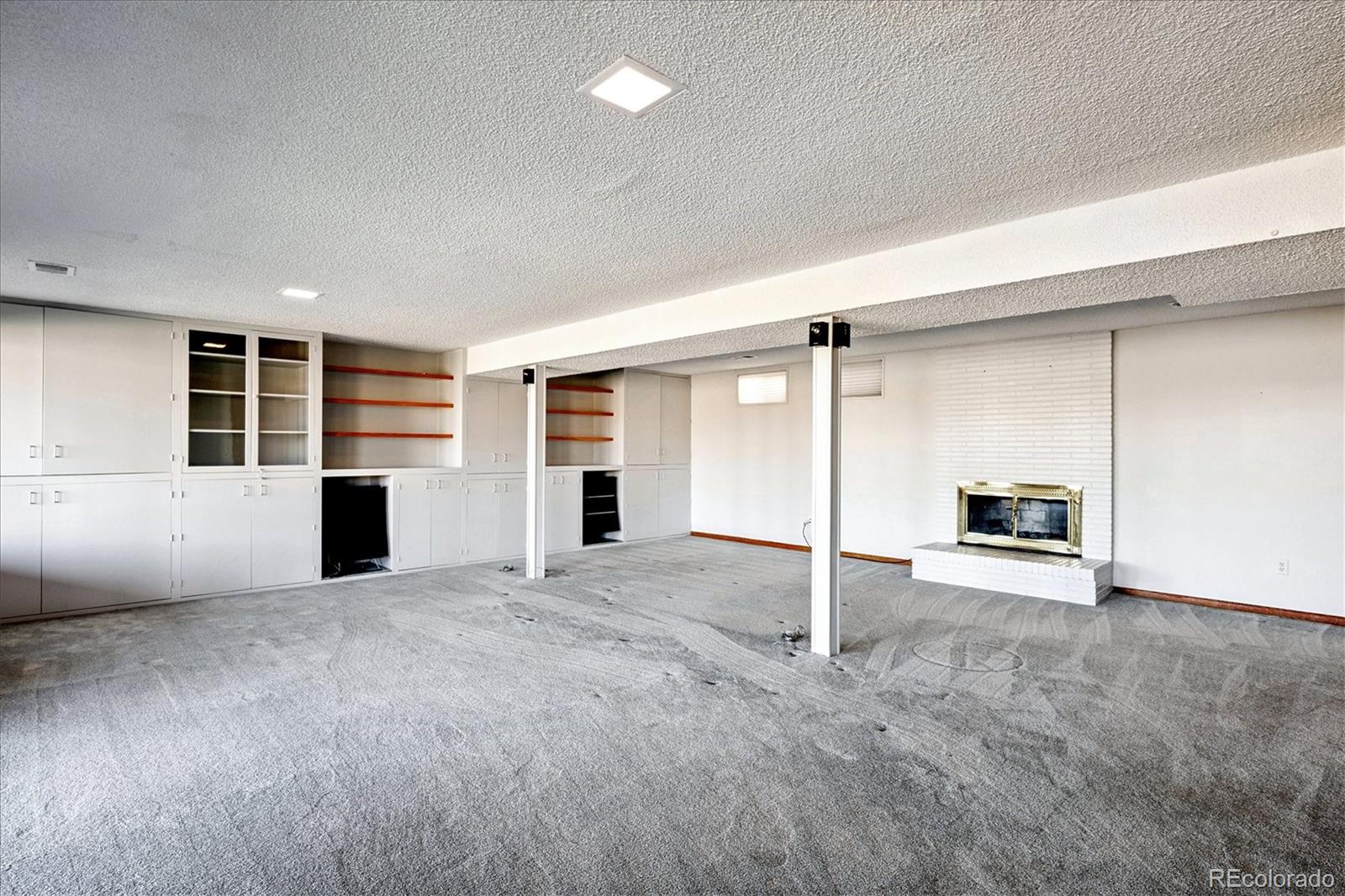 14935 West 58th Place Golden, CO 80403 - Photo 17 of 31 an empty room with a empty space and windows