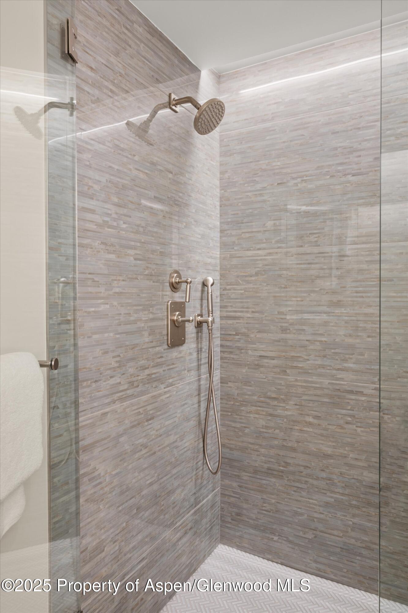 130 Wood Road, Unit 353355 Snowmass Village, CO 81615 - Photo 14 of 41 a bathroom with a shower