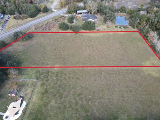 a picture of water with a road