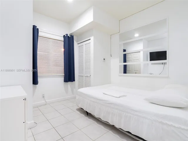 a backyard of a house with outdoor seating