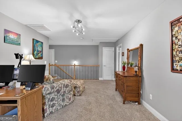 a workspace with furniture and window