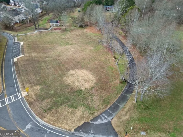 a view of living room with furniture and a window