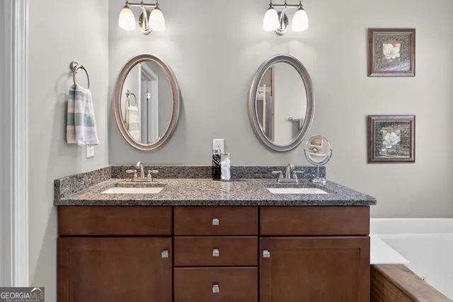 a picture of a bathroom with mirror