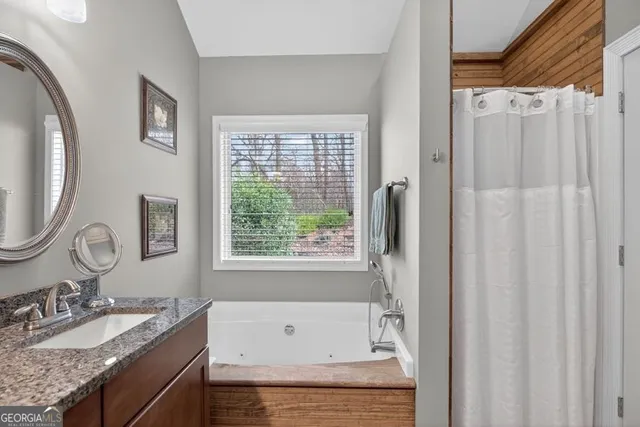 a view of backyard with seating space and plants