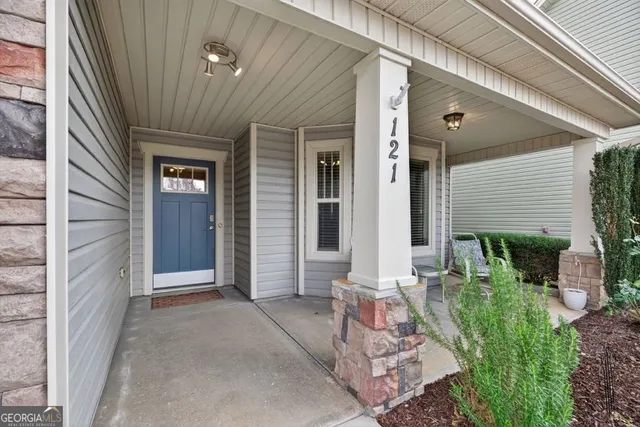 a porch with seating space