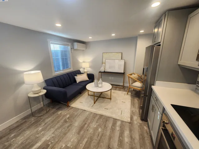 a living room with furniture and a table