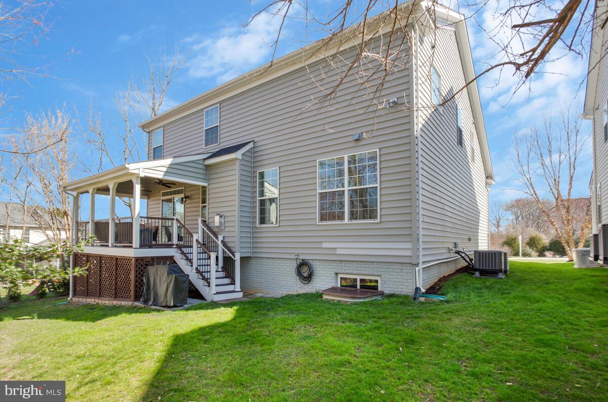802 Phyllis Street Odenton, MD 21113 - Photo 34 of 35 a view of a house with a backyard