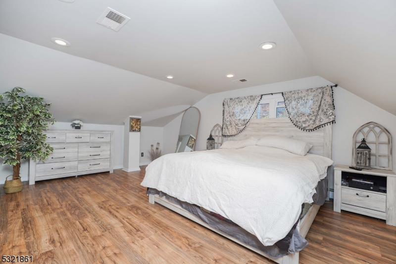 13 Bartle Road Somerset, NJ 08873 - Photo 16 of 24 a spacious bedroom with a bed and a cabinets