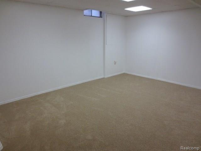 21720 River Ridge Trail Farmington, MI 48335 - Photo 26 of 31 Basement Carpet 4.jpg