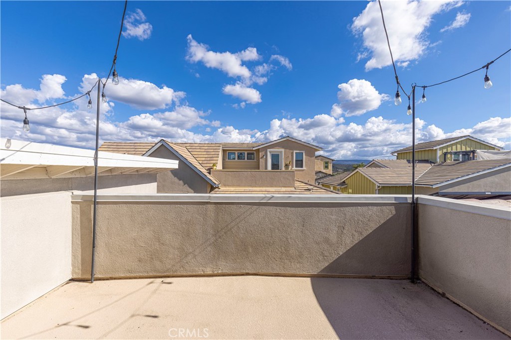 166 Natal Road Rancho Mission Viejo, CA 92694 - Photo 11 of 45 a view of a house with a roof deck