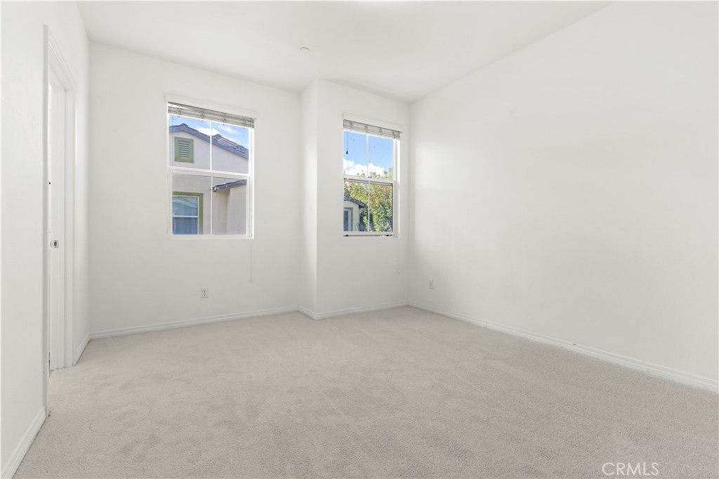 166 Natal Road Rancho Mission Viejo, CA 92694 - Photo 17 of 45 an empty room with windows