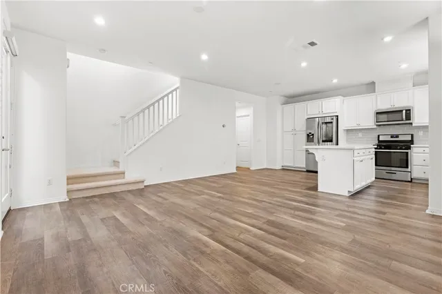 an aerial view of residential houses and outdoor space