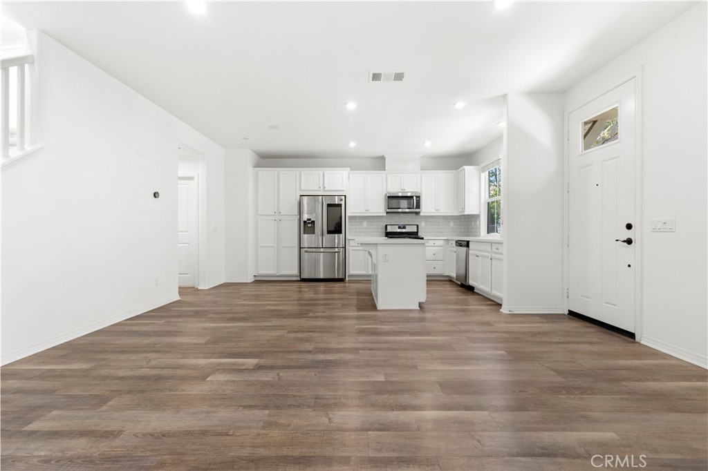 166 Natal Road Rancho Mission Viejo, CA 92694 - Photo 34 of 45 a view of kitchen with wooden floor