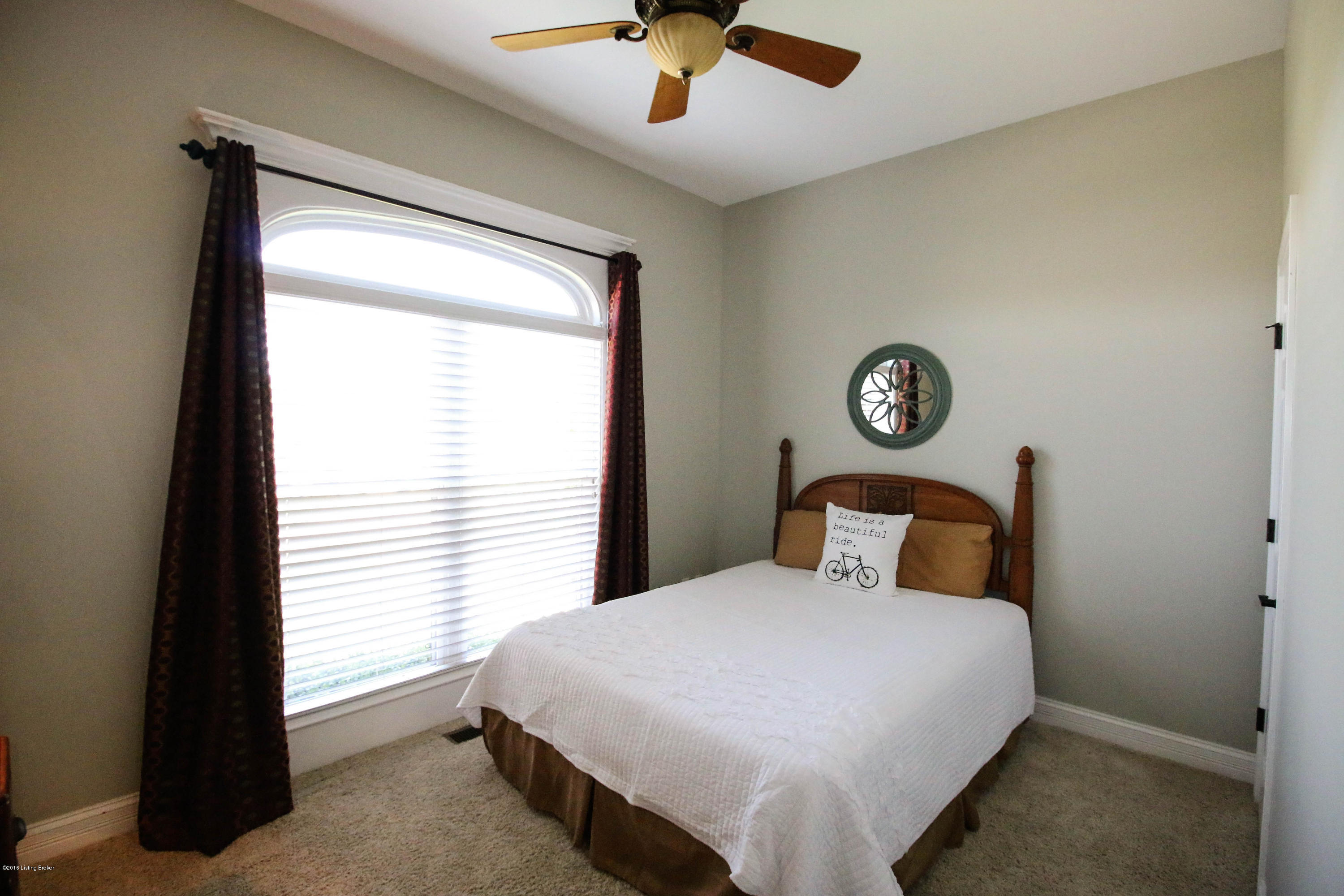 2904 Doe Ridge Court Prospect, KY 40059 - Photo 19 of 86 The fifth bedroom is found on the first floor and features an adjacent bathroom.