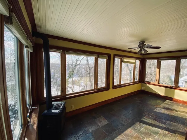 a view of a room with a large window