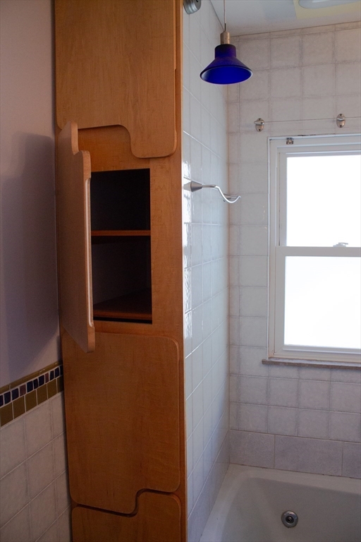 2-4 Sunset Hill Road Boston, MA 02132 - Photo 26 of 34 a bathroom with a shower