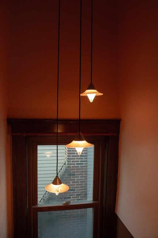 2-4 Sunset Hill Road Boston, MA 02132 - Photo 32 of 34 a lamp on a table in a room