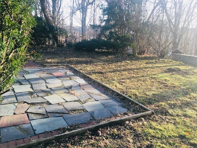 2-4 Sunset Hill Road Boston, MA 02132 - Photo 33 of 34 a view of a yard with trees