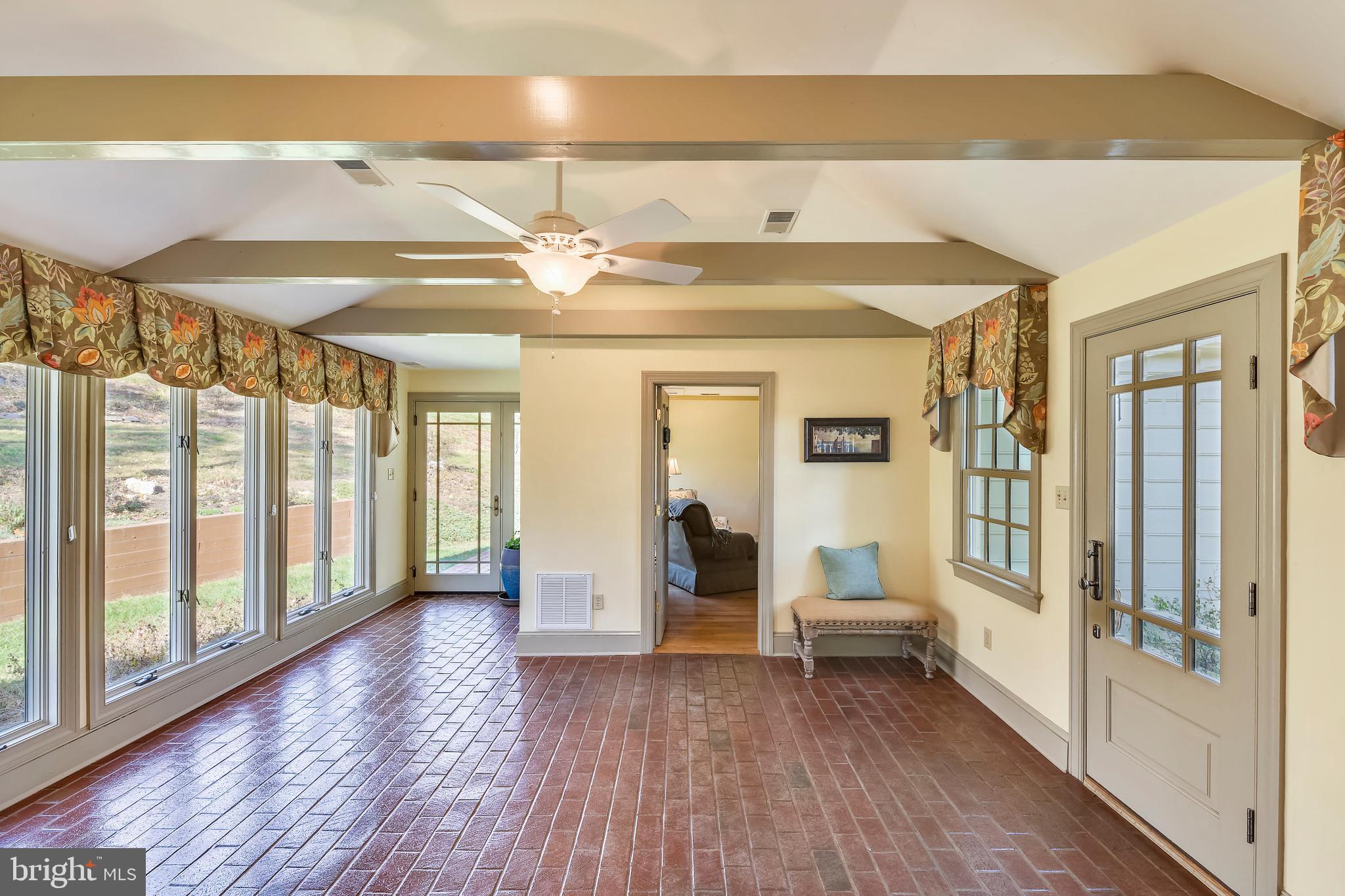 669 Apple Pie Ridge Road Winchester, VA 22603 - Photo 31 of 67 Sunroom with brick flooring