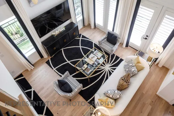 a living room with furniture and a window